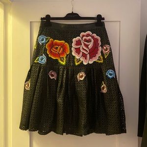 Beautiful laser cut leather pleated Carolina Herrera Skirt